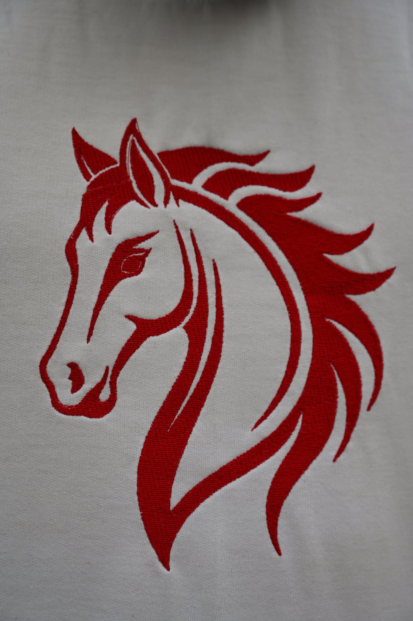 Oversized White T-Shirt – Bold Horse Stitch & Branding